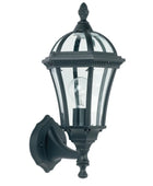 Black outdoor wall light fixture with clear glass on a white background