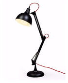 Black adjustable desk lamp with a white background