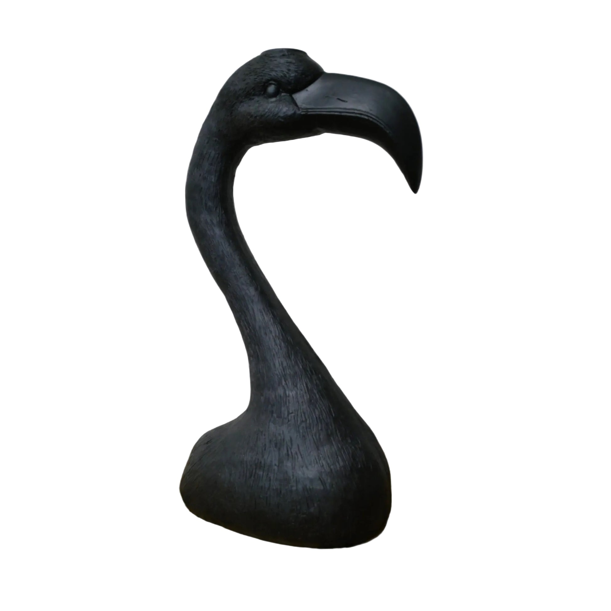 Black flamingo sculpture on a wooden surface with a white background