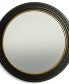 Round wall mirror with a dark textured frame and a thin gold inner trim, shown against a plain white background.