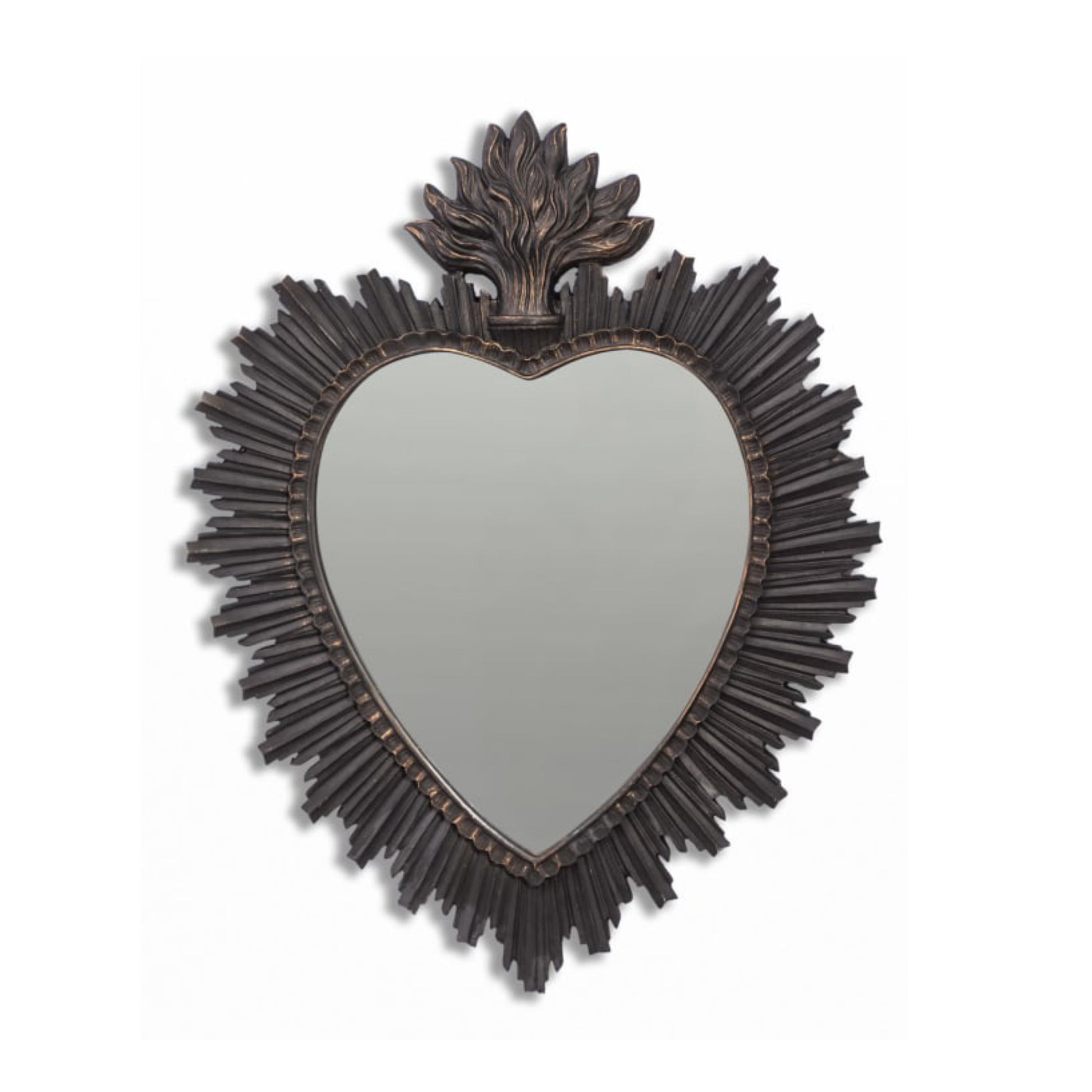 Heart-shaped mirror with decorative frame on a white background