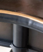 Close-up of a wheelchair's armrest and seat