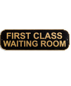 Sign reading 'FIRST CLASS WAITING ROOM' on a black background