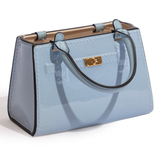 Light blue handbag with a gold clasp on a white background