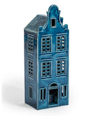A blue ceramic Dutch house figurine with a textured glaze, featuring detailed window cutouts and a stepped gable, set against a plain white background.