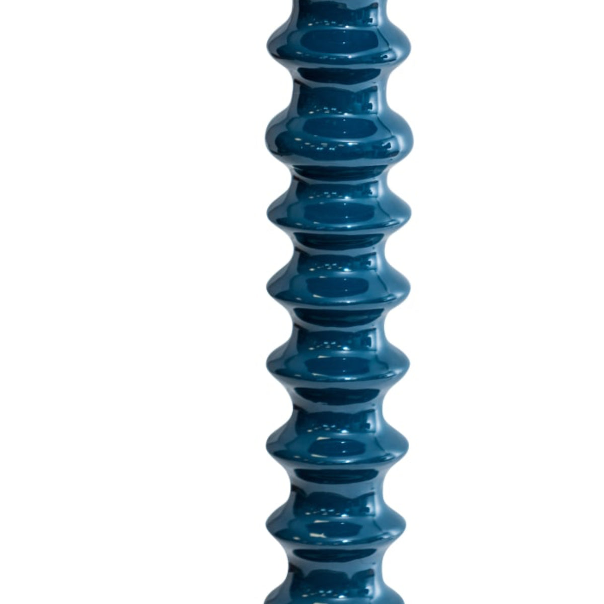 A tall, narrow ribbed vase or decorative column in glossy deep teal-blue, shown upright against a plain white background.