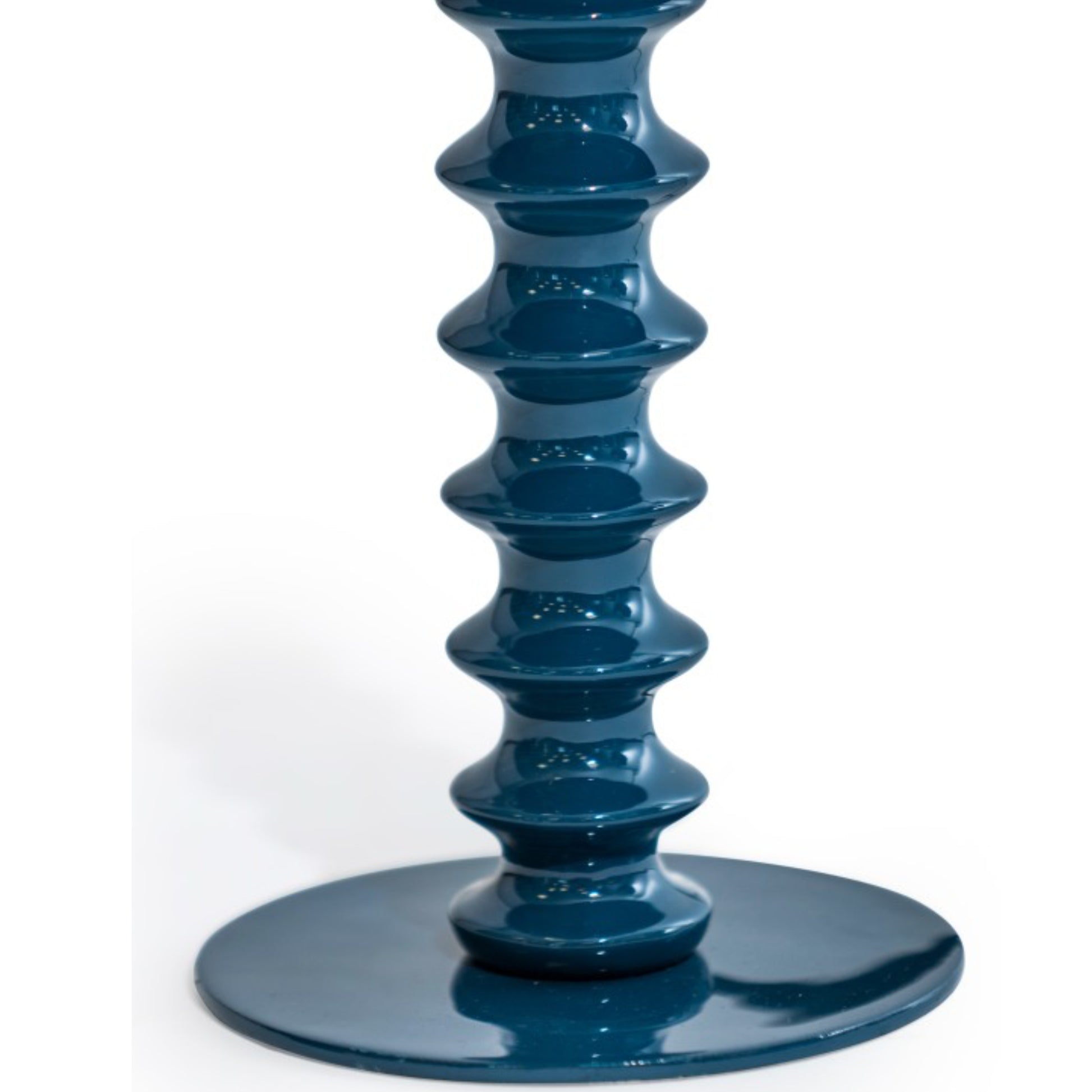 Blue candle holder on a white background