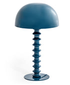 Blue table lamp with a unique design on a white background