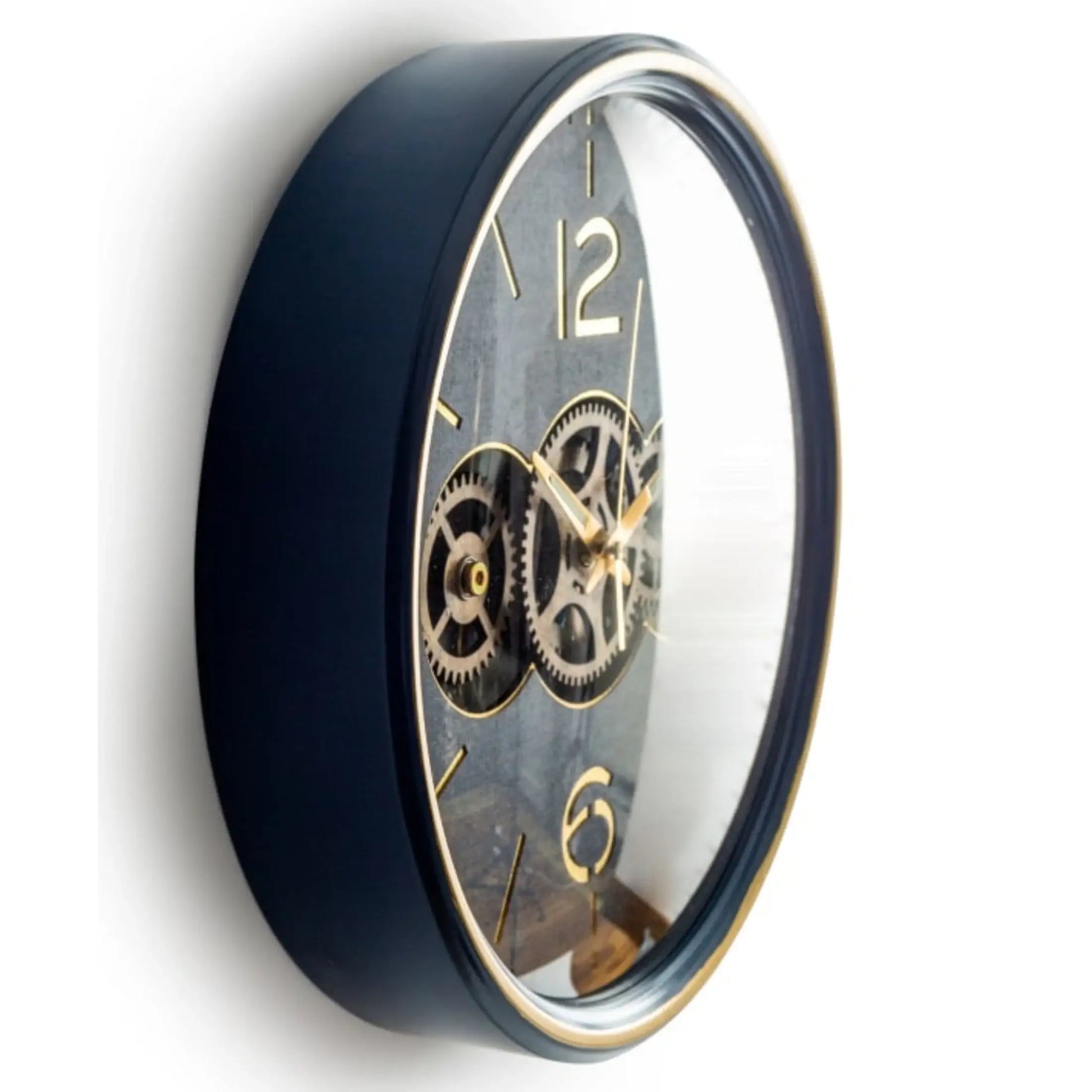 Wall clock with black casing and gold details on a white background