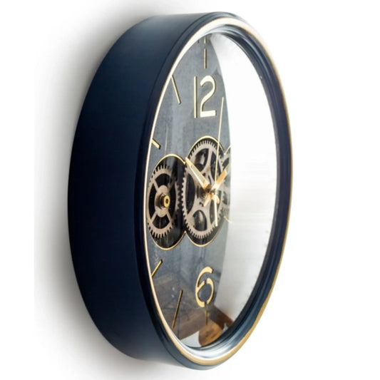 Wall clock with black casing and gold details on a white background