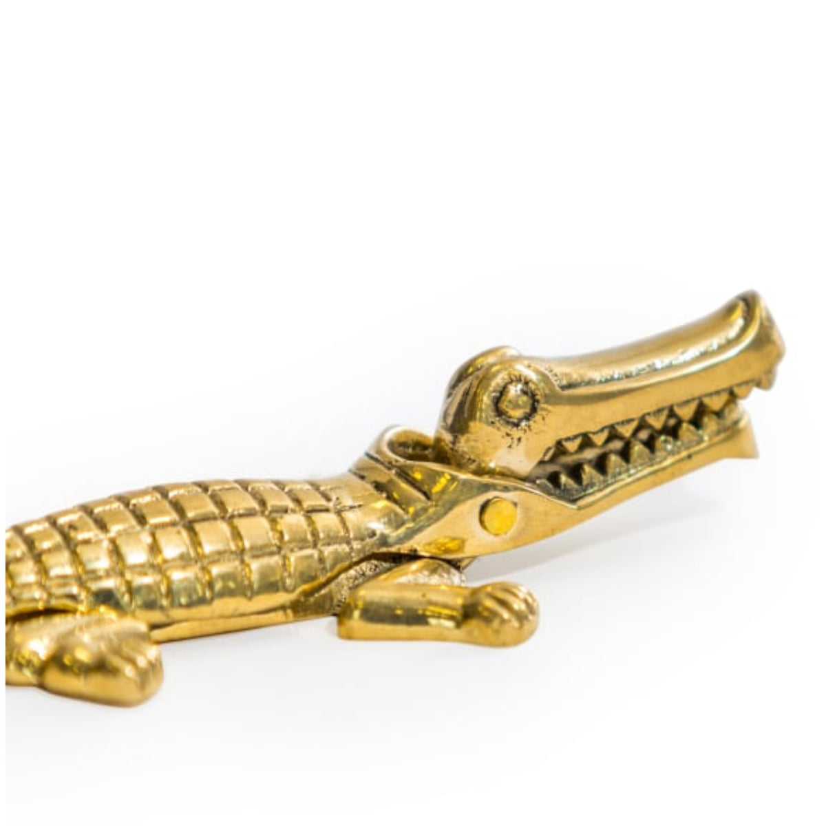 A small metallic gold alligator figurine with a textured scale pattern, shown on a plain white background.