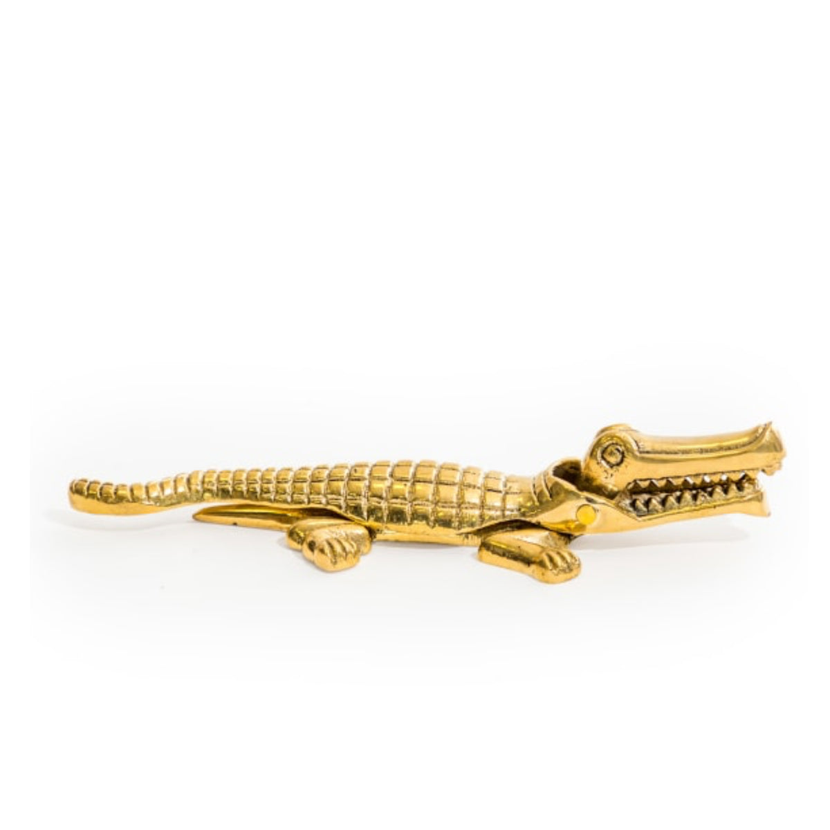 A gold-finished alligator-shaped accessory, likely a brooch or pin, shown against a plain white background.