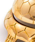 Close-up of a gold textured object on a white background