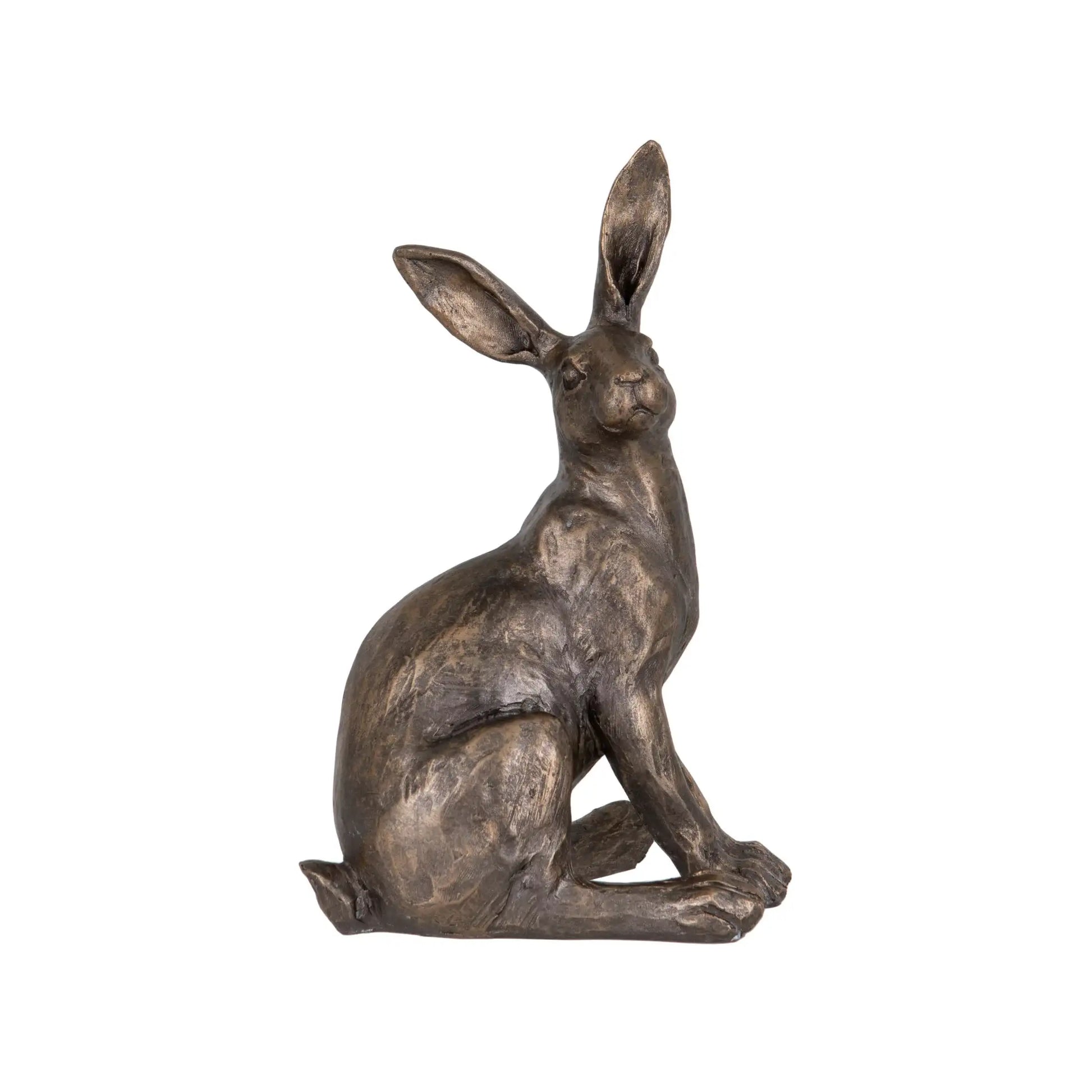 Bronze rabbit statue on a white background