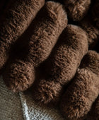 Close-up of brown plush fabric texture