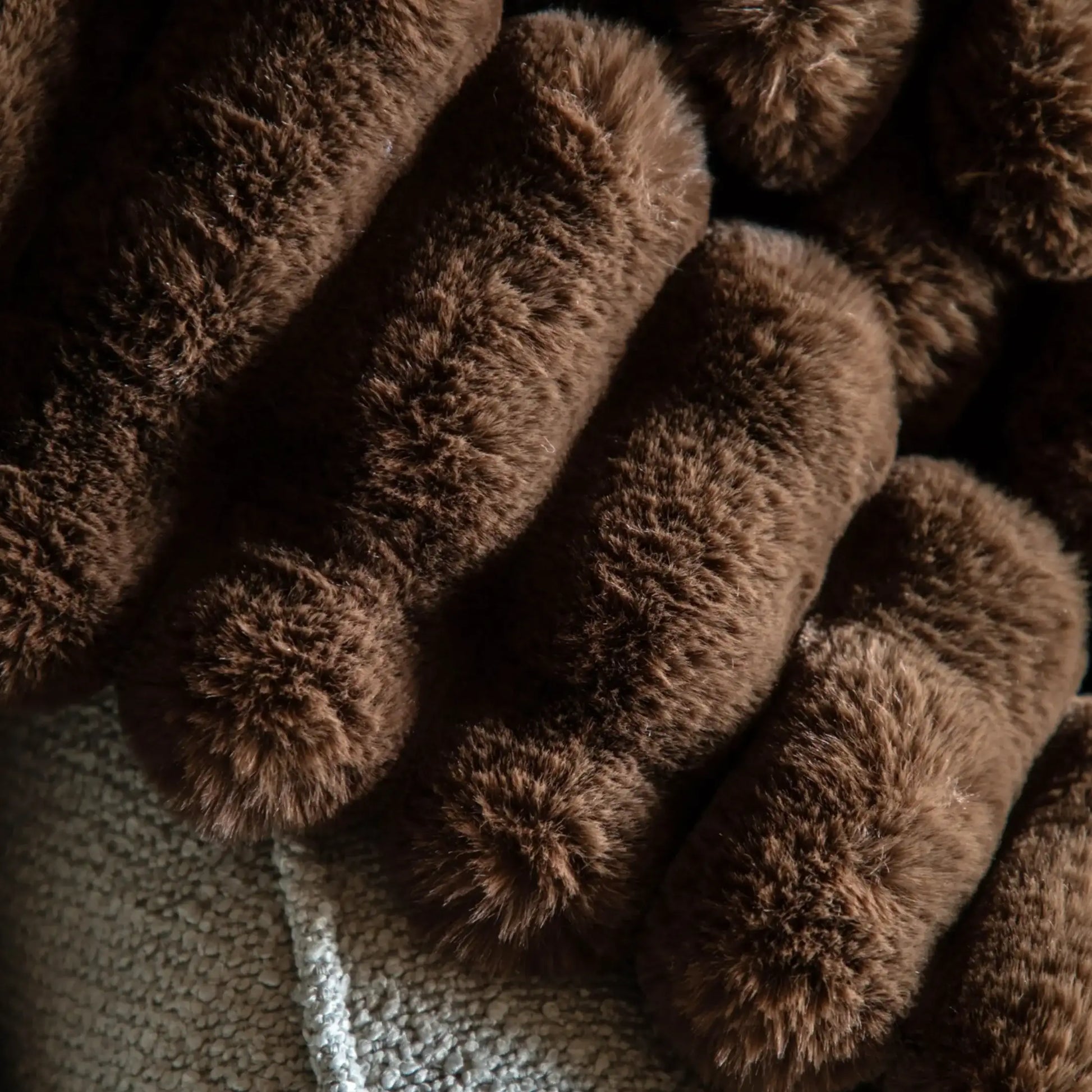 Close-up of brown plush fabric texture
