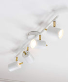 Brushed Brass and Matt White 4 Gang Spot Lamp - The Farthing