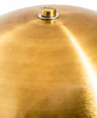 Close-up of a gold cymbal with a reflective surface