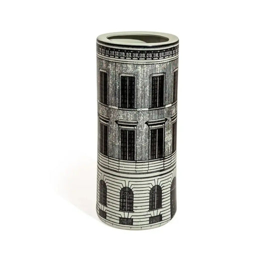 Cylindrical vase with architectural design on a white background