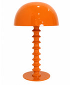 Orange table lamp with a textured base on a white background