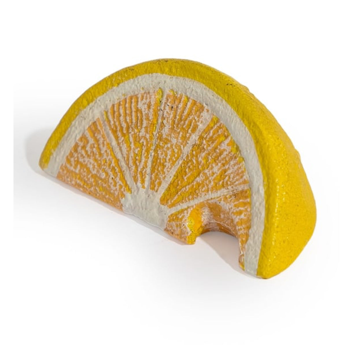 A yellow and orange citrus wedge sculpture or decorative object with textured orange segments and a bright yellow rind, shown on a plain white background.