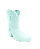 Mint green cowboy boot on a white background