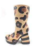 Tan boot with black and brown abstract pattern on a white background