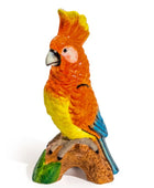Colorful parrot figurine on a white background