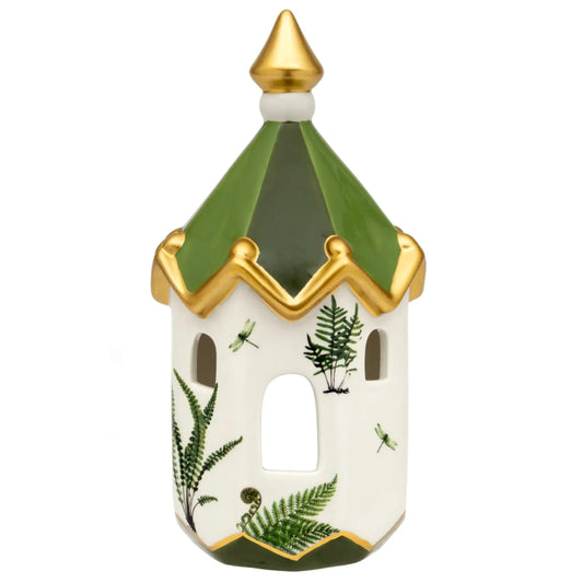 Decorative birdhouse with green roof and gold accents on a white background