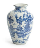 Blue and white ceramic vase with floral and bird pattern on a white background