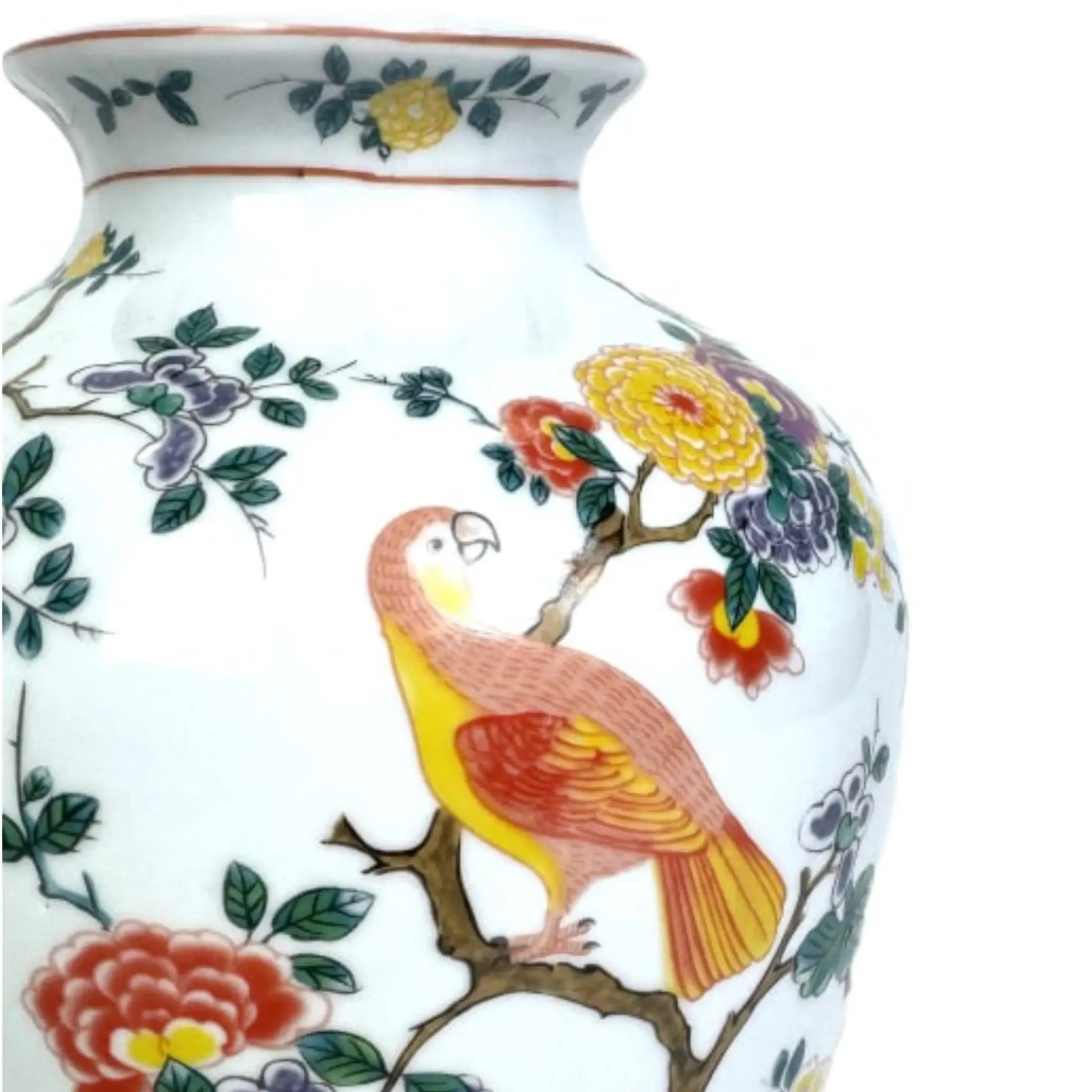 Decorative vase with colorful parrot and floral design on a white background