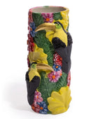 Decorative vase with bird and floral design on a white background