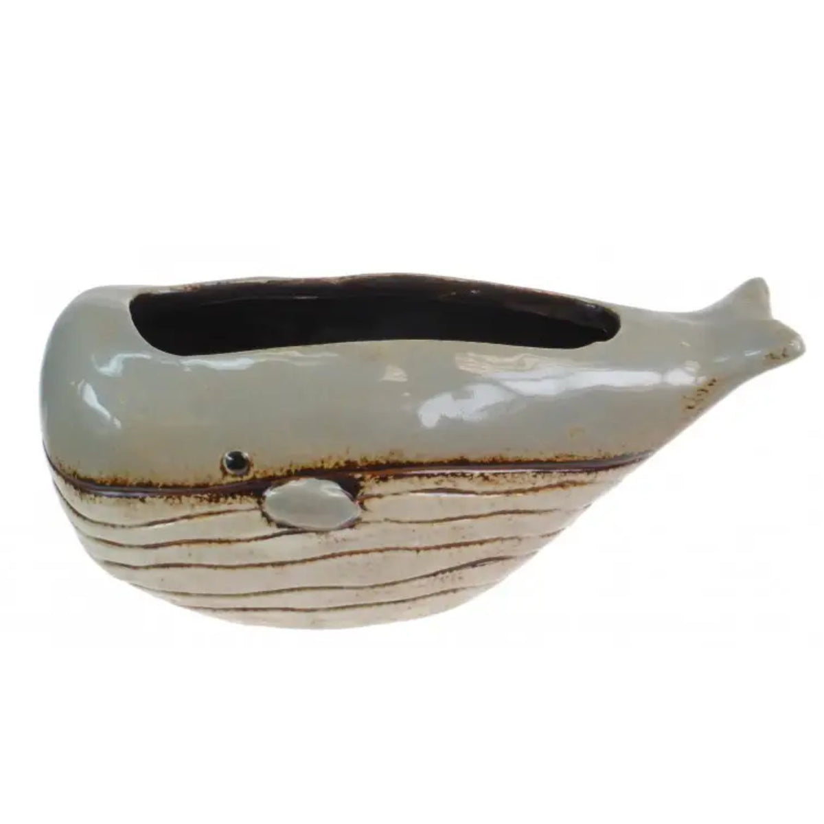 A ceramic whale-shaped planter with a glossy light gray-blue upper body, a textured cream lower body with brown horizontal lines, and a dark interior, shown on a plain white background.