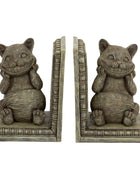 A pair of bookend-style cat figurines with a weathered gray and bronze finish, shown from the front and side against a white background.