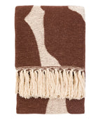 Brown and beige patterned blanket with tassels on a white background