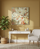 Living room with a floral painting on the wall, a white console table, and a chair.