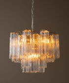 Chandelier with glass shades on a dark background