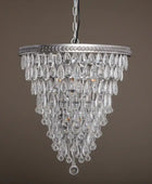Crystal chandelier hanging against a brown background