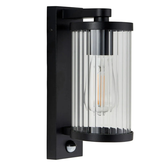 Black outdoor wall light fixture with clear glass shade on a white background