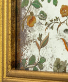 Floral patterned fabric with a gold frame