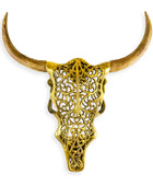 Decorative gold bull skull with long horns on a white background