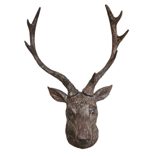 Decorative deer head with large antlers on a white background