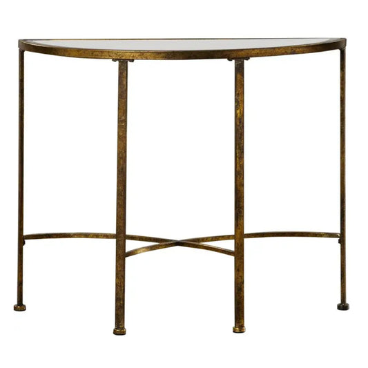 A semi-circular console table with a distressed gold metal frame and a clear glass top, shown against a plain white background.