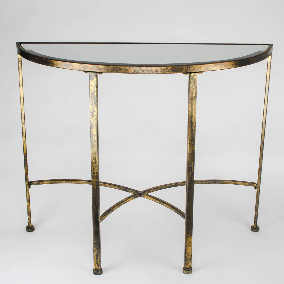 A semi-circular console table with a distressed gold metal frame and a dark glass tabletop, shown against a neutral light gray background.