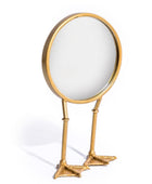 Gold magnifying glass with a white round lens on a white background