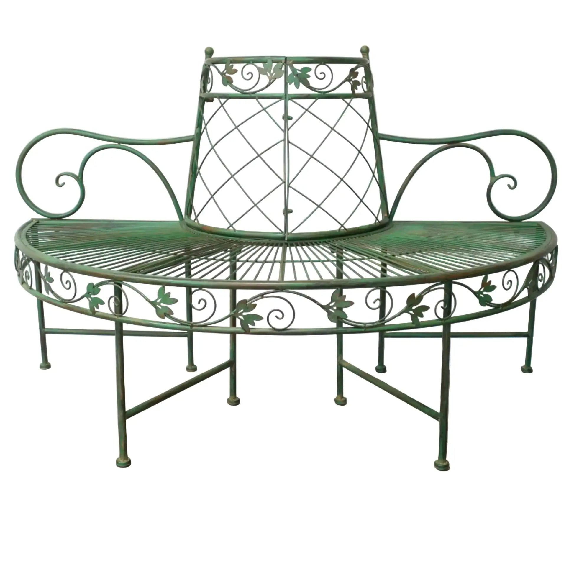 Green metal bench with decorative patterns on a wooden floor.