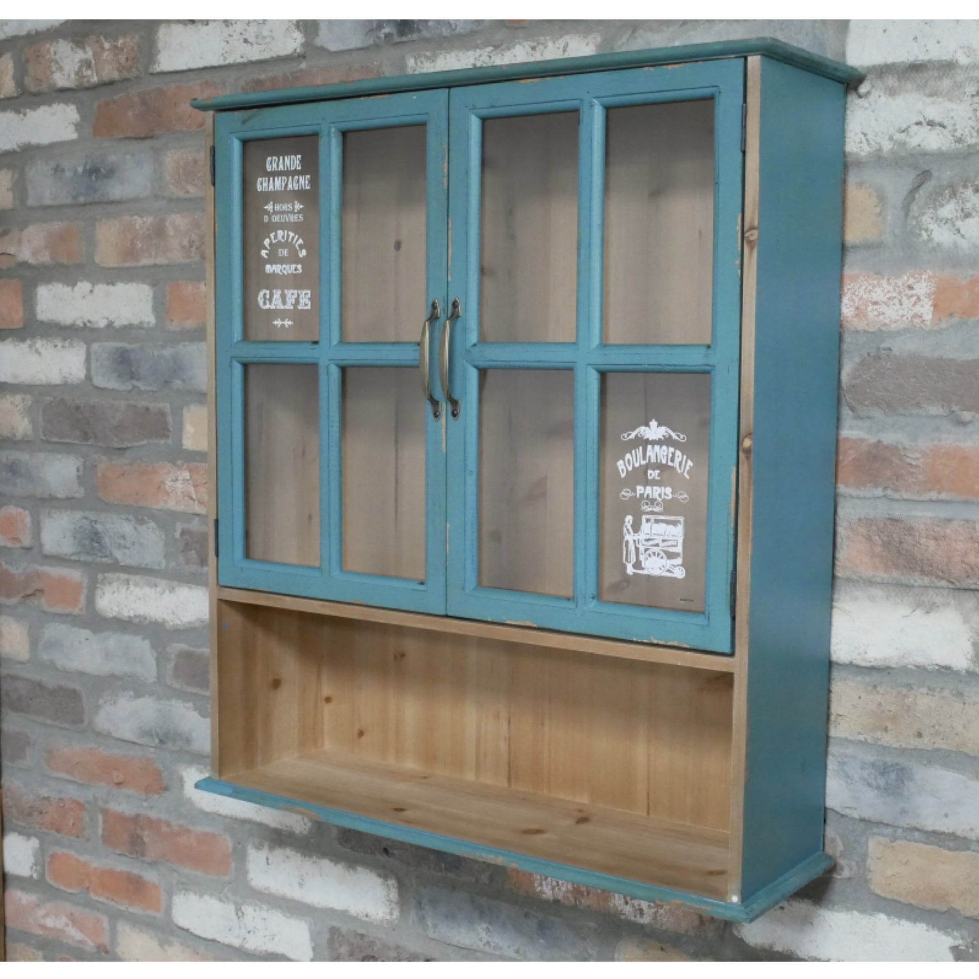 Wooden cabinet with glass doors against a stone wall