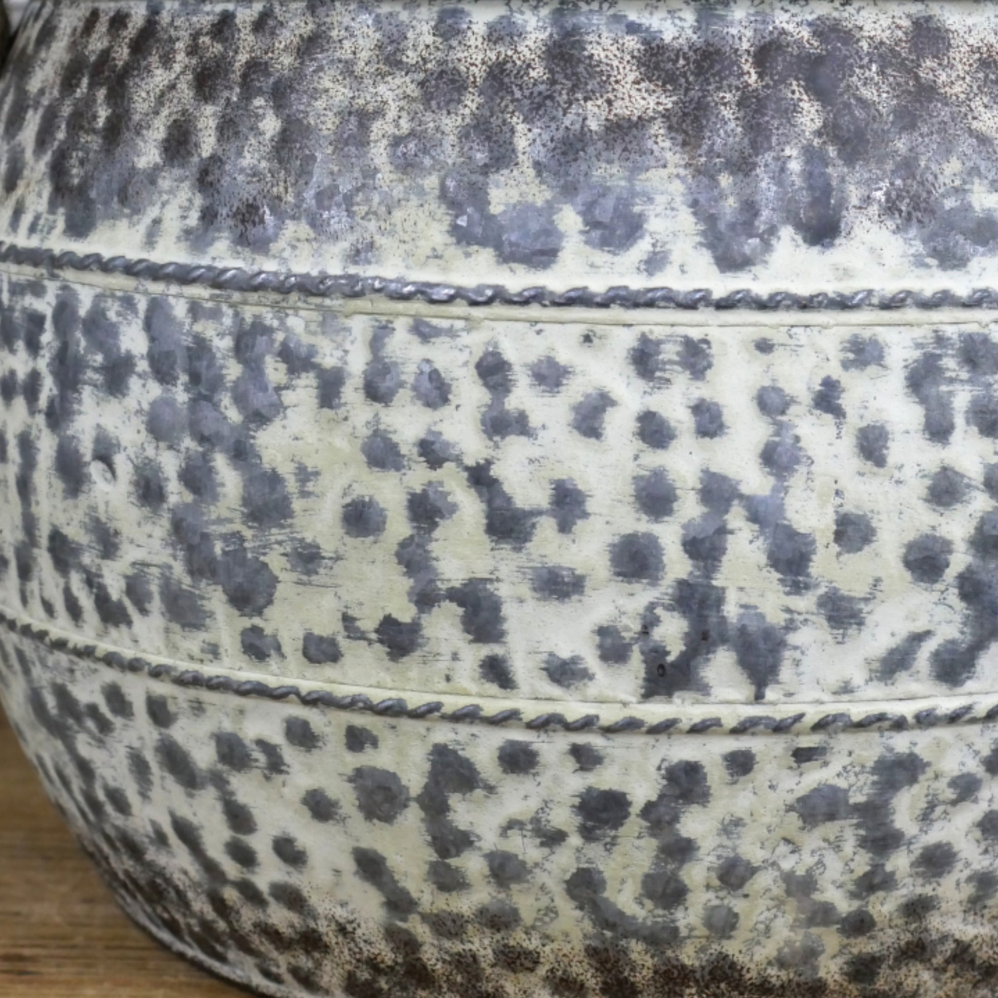 Close-up of a textured ceramic bowl with speckled pattern