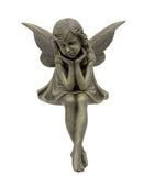 Bronze fairy figurine with wings on a white background