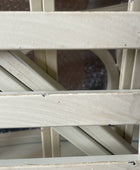 Close-up of a wooden crate with visible grain and texture.